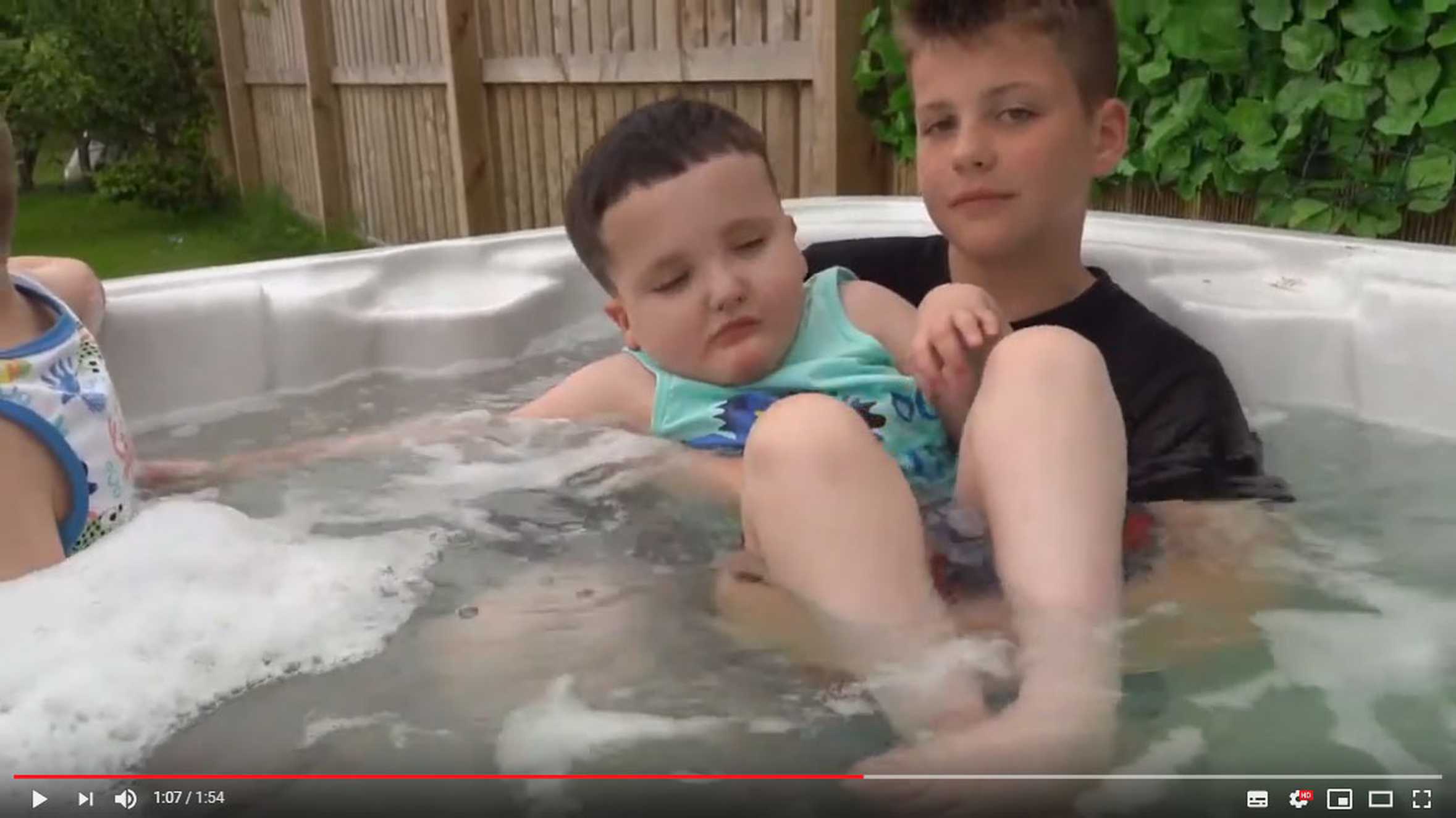 Hayden and his brother in the spa pool